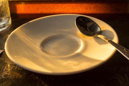 White coffee saucer to watch the sunset.