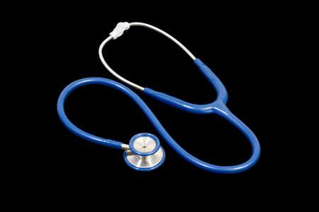 Closeup of a medical stethoscope on black backgroundの写真素材