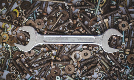 Wrench tool equipment, wrenches on assorted nuts and bolts.