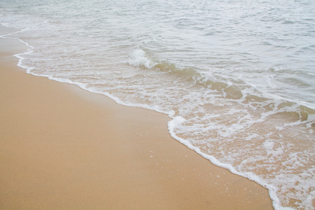 Soft wave of sea on the sand beachの写真素材