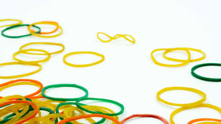 Rubber band or plastic band, Group of multicolor rubber bands on white background.の写真素材