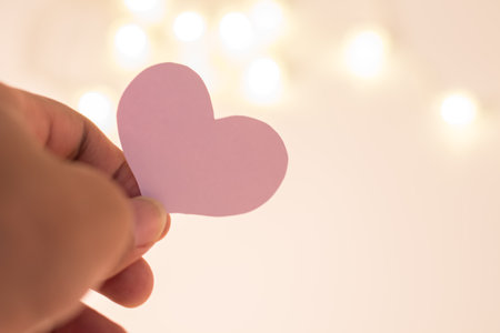 Heart shaped paper cutting design card with empty space.の写真素材
