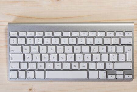 keyboard on wooden board