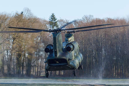 Olst Feb 7 2018: Army and Air Force helicopter exercise Chinook landing to drop soldiers