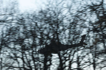 Olst Feb 7 2018: Army and Air Force helicopter exercise. Apache covering pick up zoneのeditorial素材