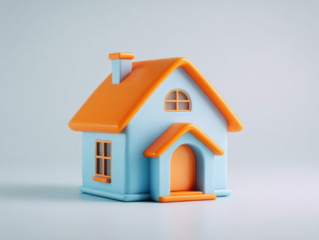 This image presents a cartoon illustration of a house. The house features a blue body and an orange roof, chimney, and door. It is set against a light background, and the composition suggests a simple, clean aesthetic. Suitable for various design projects, this graphic can be used for conceptual illustrations.の素材