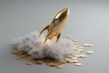 A golden rocket sits atop a cloud, surrounded by coins, set against a neutral gray backdrop. The image features soft lighting and a focus on the central subject. This conceptual illustration can be used to represent financial growth, success, or new ventures in various commercial applications.の素材