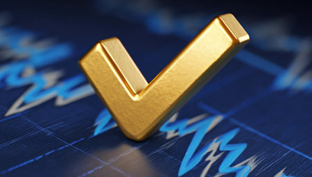 A close-up view presents a gold check mark set against a blurred background of a blue financial chart. The composition features soft lighting, highlighting the metallic texture. It suggests the concepts of approval, achievement, and positive outcomes, suitable for commercial projects.の素材