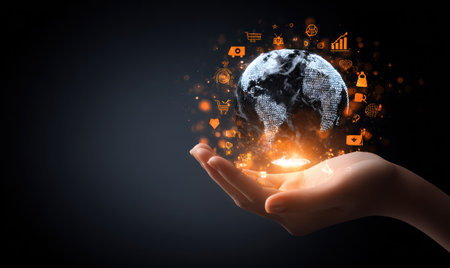 A hand cradles a digitally rendered globe, surrounded by glowing icons. Warm orange hues illuminate the scene, contrasting against a dark background. The image showcases a modern style with elements of technology and finance. Suitable for various uses, this image captures themes of innovation and global connectivity.の素材