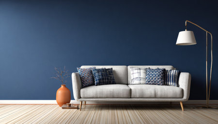A stylish interior features a light-colored sofa with patterned pillows against a deep blue wall. An arched lamp provides illumination. The composition includes a ceramic vase. This image may be suitable for home decor or interior design projects, showcasing modern design.の素材