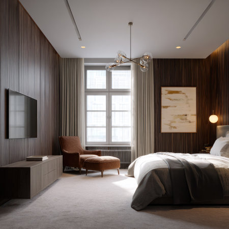 This image showcases a modern bedroom interior featuring a comfortable bed, armchair, and wooden panel walls. The composition highlights neutral tones, soft textures, and natural lighting from a large window. It could be suitable for use in design publications, advertising, or as a background for various projects.の素材