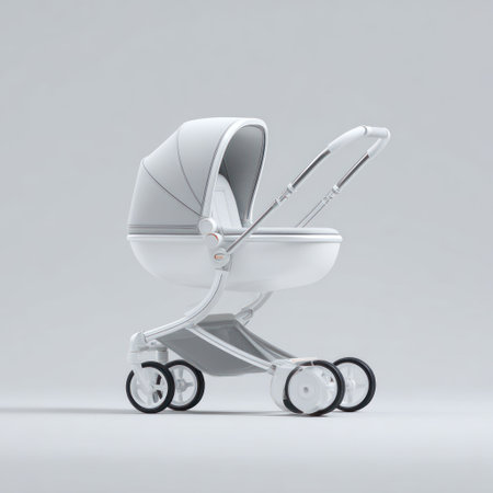 A minimalist image showcases a pristine white baby stroller against a neutral backdrop. The stroller's design emphasizes clean lines and a contemporary aesthetic. The lighting creates subtle shadows, emphasizing the three-dimensional form. This visual is suitable for commercial applications related to childcare and product design.の素材