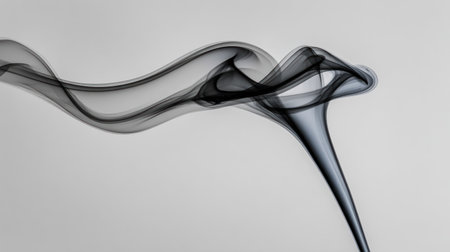 An artistic depiction presents swirling smoke in shades of gray against a white background. The composition highlights flowing forms and elegant lines. The interplay of light and shadow defines the texture. Suitable for various applications, including design projects and visual content creation.の素材