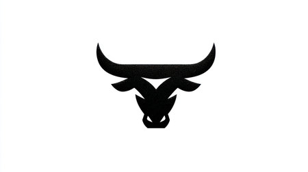 A silhouette of a bull's head is presented against a white backdrop. The design utilizes a monochromatic palette and a simple, geometric style. The image has high contrast, and the composition is straightforward, ideal for various applications. It can be used for branding, logos, and illustrative purposes.の素材