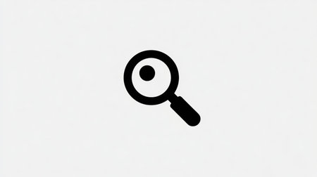 A black magnifying glass icon sits centered against a clean white backdrop. The graphic shows a circular lens with a centered dot and a handle. The minimalist design emphasizes simplicity and visual clarity. Suitable for diverse applications requiring search or investigative themes.の素材