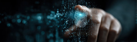 A close-up shot features a human hand interacting with a digital cloud, rendered with a glowing effect. The image uses dark tones, emphasizing the blue luminescence. It could be suitable for illustrating concepts such as technology, communication, and connectivity, with potential uses in various commercial applications.の素材