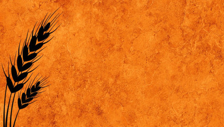 This image features a detailed silhouette of wheat stalks set against a textured, orange background. The composition uses high contrast, with the dark stalks standing out against the bright backdrop. The style appears artistic and the visual suggests potential use in designs related to agriculture or food production. The image offers copy space for a variety of commercial and editorial uses.の素材