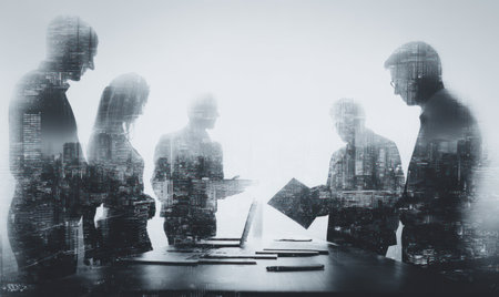 A group of professionals collaborates around a table, their silhouettes merging with an urban scene. The image presents a monochromatic aesthetic with layered transparency creating a sense of depth and mystery. The style may be suitable for illustrating teamwork, strategy, or financial topics. Could be used for commercial projects.の素材