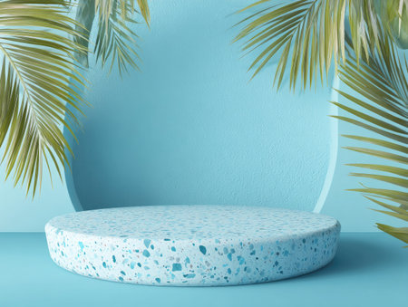 A minimalist product display features a round pedestal against a blue backdrop with overhead lighting. The composition includes tropical palm fronds. This visual presents a serene and elegant setting for advertising. It can be used for showcasing products or in lifestyle content.の素材