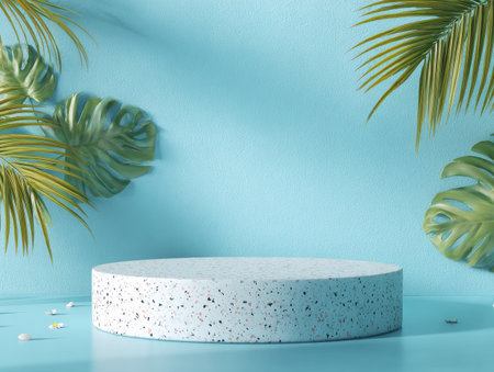 A circular pedestal stands in front of a blue backdrop, adorned with lush green tropical leaves. The composition employs soft lighting and a minimalist aesthetic. This image is suitable for product showcasing or advertising, providing a clean and inviting atmosphere for various commercial applications.の素材