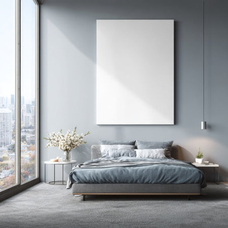 This interior scene presents a contemporary bedroom, featuring a large blank canvas above a comfortable bed. The color palette incorporates cool tones, with natural light streaming through a large window. This versatile setting could be used for lifestyle imagery or as a background for design concepts.の素材