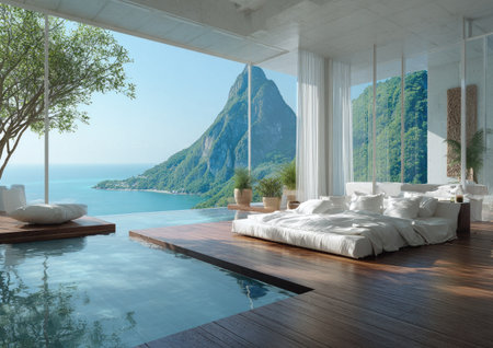 A spacious bedroom features a pool area with a breathtaking view of the ocean and mountain range. Natural light floods the room, illuminating white bedding and wooden floors. The composition emphasizes a sense of tranquility and luxury, suitable for interior design and travel publications.の素材