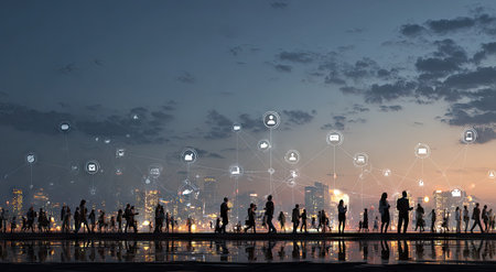 This image depicts silhouetted individuals walking in front of a cityscape, set against a colorful dusk sky. Digitally rendered social media icons are layered over the people and buildings. The composition features a low angle view with soft lighting, suggesting an evening or early morning. This could be useful for projects related to technology, communication or social themes.の素材