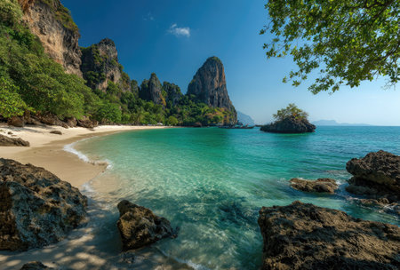 A stunning coastal view showcases a secluded beach with vibrant turquoise water gently lapping the shore. Rugged cliffs and lush greenery frame the scene, bathed in bright sunlight. The composition emphasizes natural elements, potentially suitable for travel or environmental themes.の素材