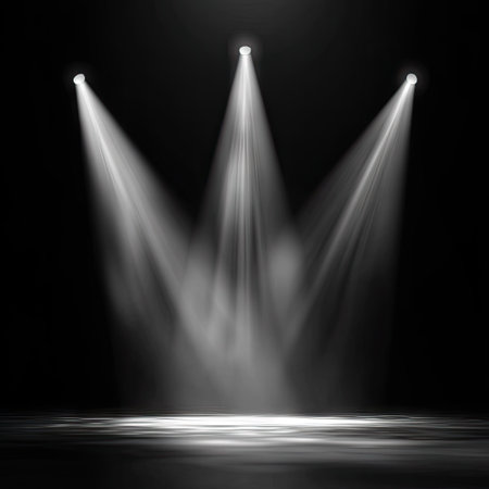Three spotlights illuminate a dark stage, creating a dramatic visual. The lighting beams are bright against a black background, with visible light flares. The composition creates a sense of depth and focus, suitable for presentations or other visual projects. Ideal for use in design or editorial contexts.の素材