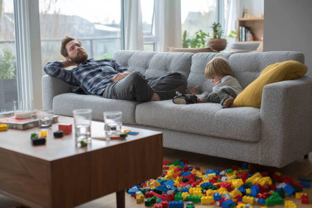 A man and a child are seen on a sofa in a modern living room setting. The scene features natural lighting and a neutral color palette, dominated by light tones. The composition includes a coffee table with items. Suitable for general lifestyle concepts and illustrative projects.の素材