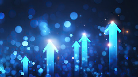 An image displays glowing blue arrows ascending against a dark backdrop filled with blurred circular lights. The composition emphasizes upward movement with a gradient effect adding depth. This graphic could be used in various applications, including presentations, websites, and marketing materials to represent growth.の素材