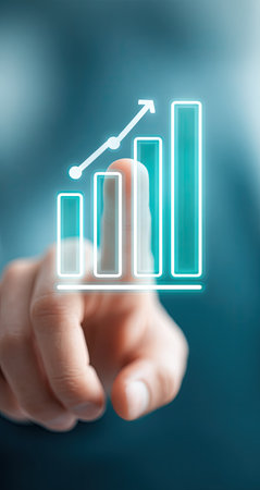 A hand touches a glowing financial chart, indicating growth and progress. The image features a bright, clean style, with a blurred background suggesting a business or technological environment. The illustration is likely suitable for articles, presentations, or advertisements related to business development and success.の素材