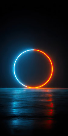 A glowing neon circle, bisected by blue and orange light, hovers above a reflective surface. The image exhibits a minimalist style with a dark, spacious background and a smooth, wet-look texture. The circular form creates a sense of balance. This image could be suitable for digital design, technology concepts, or advertising.の素材