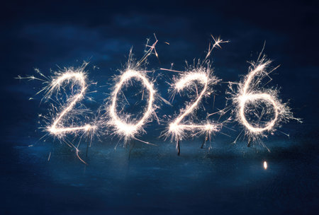 The numeral 2026 is formed by bright sparks against a dark background. The image displays a festive aesthetic with glowing lines. Ideal for representing the new year or a future concept, the composition evokes celebration. Suitable for various commercial and editorial applications.の素材