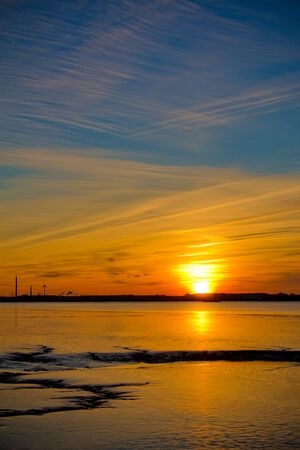Rare and one of the most beautiful cloud formation at sunset in the evening in Bremerhaven, Germanyの写真素材
