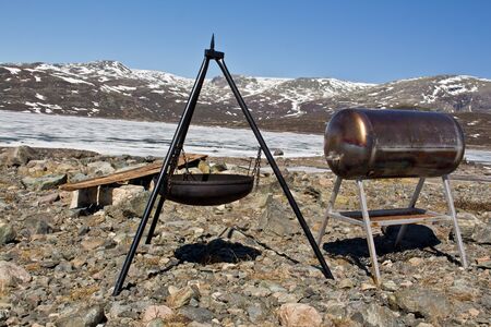 Norway landscape, snow and mountains with barbecue area in the barren wilderness.の写真素材