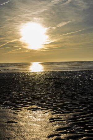 Beautiful cloud formation at sunset in the evening in Bremerhaven, Germanyの写真素材
