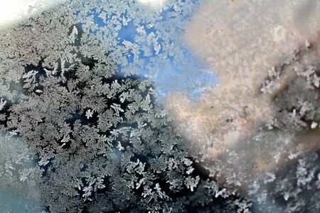 Beautiful texture with pattern of stars on slice of ice in the frost.の写真素材
