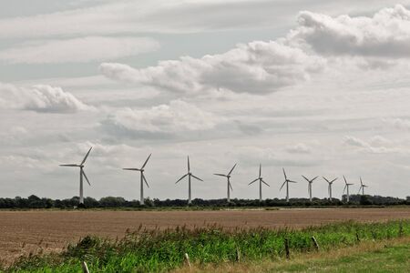 Typical landscape of northern Germany. Wind turbines wind energy landscapes.の写真素材