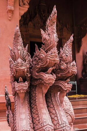 Dragons, scorpionfish, Wat Sila Ngu with the red temple Wat Ratchathammaram on Koh Samui in Thailand.の写真素材