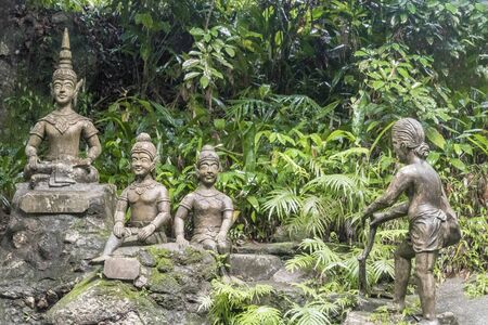 Buddha statues at Tar Nim Waterfall & Secret Magic Garden on Koh Samui, in Surat Thani Thailand.の写真素材