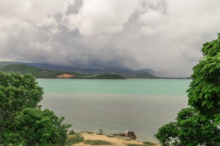 Koh Samui island in Surat Thani, Thailand. Turquoise water and gloomy storm clouds.の写真素材