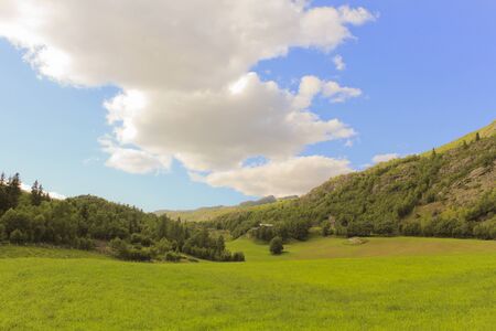 Spectacular landscape with blue sky and clouds row in beautiful Hemsedal, Buskerud, Norway.の写真素材