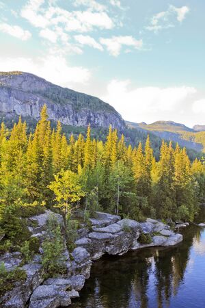 River of the beautiful waterfall Rjukandefossen with mountain views to the sunset in Hemsedal, Buskerud, Norway.の写真素材