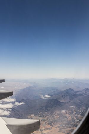 View from an airplane window at high altitude and turbines about South Africa. African Mountains.の写真素材