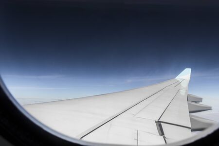 View from an airplane window at high altitude and turbines about Africa.の写真素材