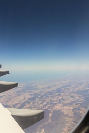 View from an airplane window at high altitude and turbines about South Africa. African Mountains.の写真素材