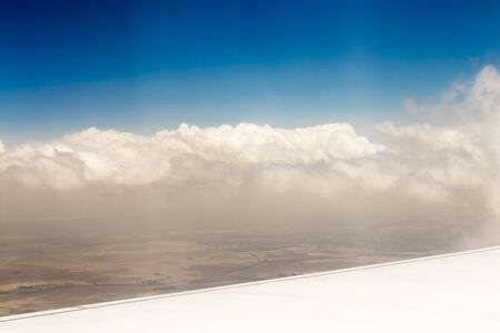 View from an airplane window at high altitude and turbines about Africa.の写真素材