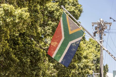 South African flag, banner, in beautiful Cape Town, South Africa.の写真素材