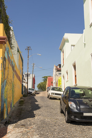 Street with paintings and many colorful houses in the Bo Kaap district in Cape Town, South Africa.のeditorial素材